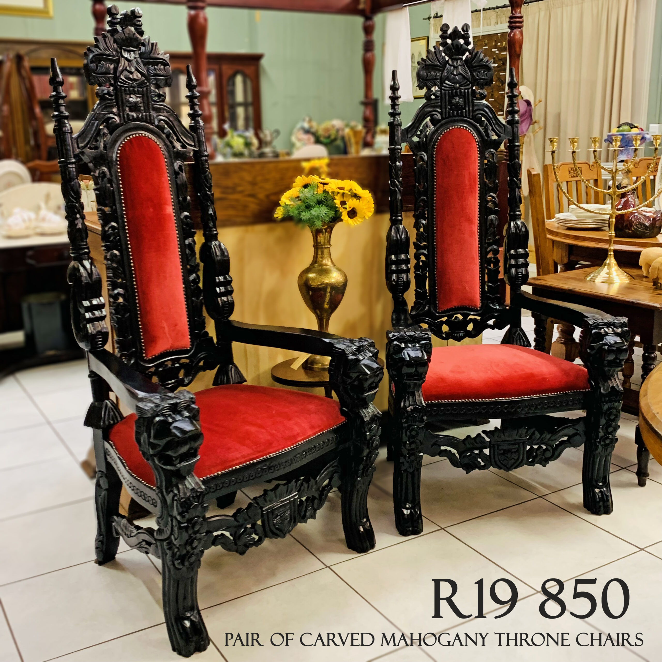 Pair of Carved Mahogany Throne Chairs
